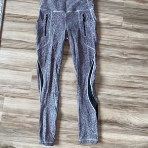 Lululemon leggings with two vertical zippers